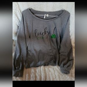 Cato top with shamrock on it